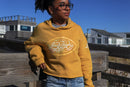 Sunrise Glow on Coastal Gold Cropped Hoodie